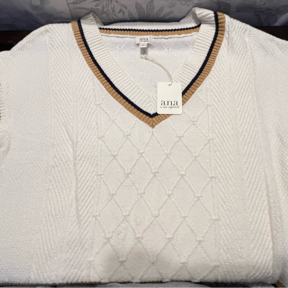 ana.  Sweater vest, so soft,